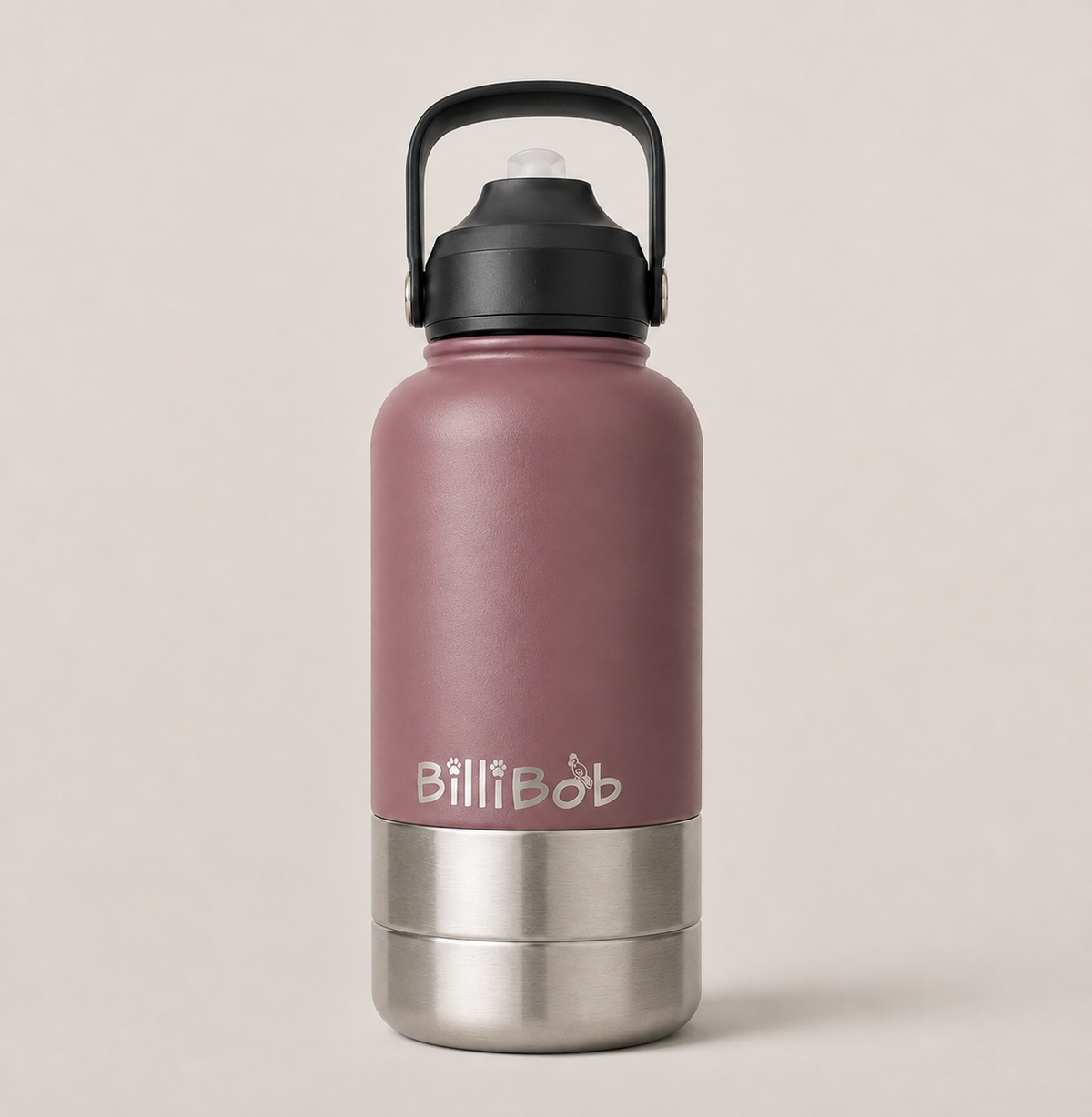 A matte dusty rose insulated water bottle with a black carry loop lid and a brushed stainless steel base, featuring the BillBob logo printed in white on the front.